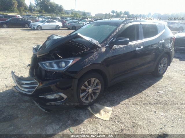 Photo 1 VIN: 5NMZU4LA7HH041311 - HYUNDAI SANTA FE SPORT 