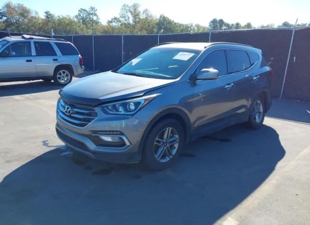 Photo 1 VIN: 5NMZUDLB0JH063262 - HYUNDAI SANTA FE SPORT 