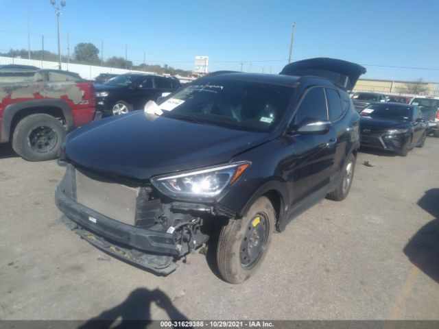 Photo 1 VIN: 5NMZUDLB0JH089912 - HYUNDAI SANTA FE SPORT 