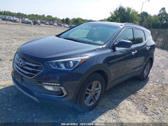 Photo 1 VIN: 5NMZUDLB8HH031203 - HYUNDAI SANTA FE SPORT 