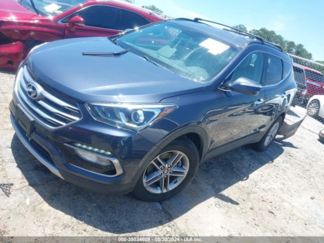 Photo 1 VIN: 5NMZUDLB8JH072582 - HYUNDAI SANTA FE SPORT 