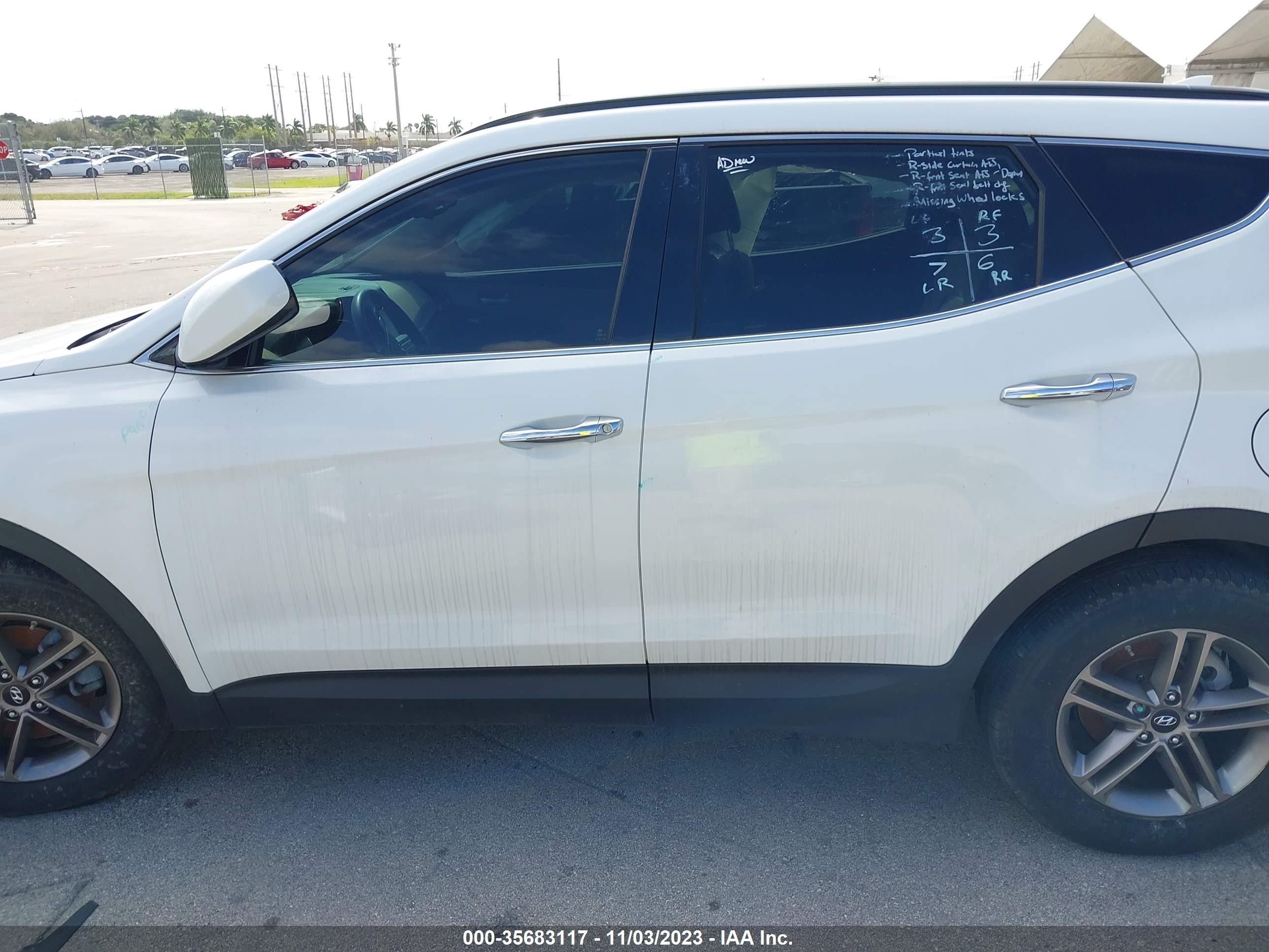 Photo 13 VIN: 5NMZUDLBXHH022874 - HYUNDAI SANTA FE 