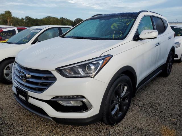 Photo 1 VIN: 5NMZW4LA6JH067088 - HYUNDAI SANTA FE S 