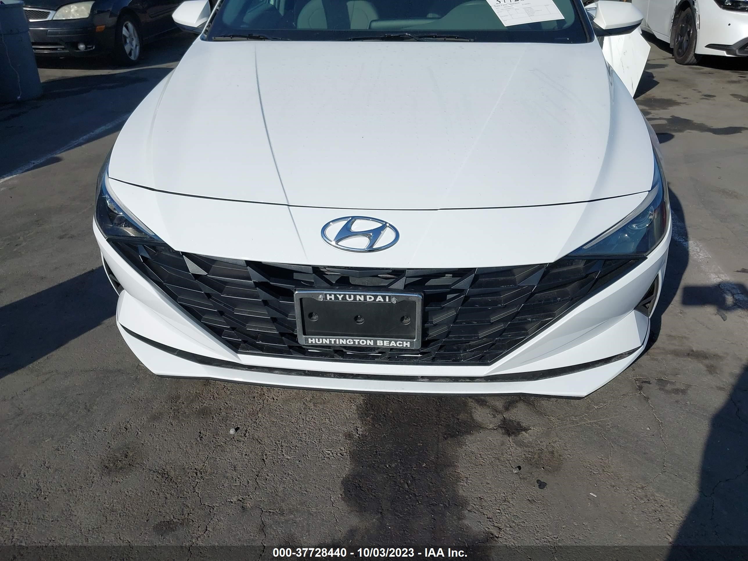 Photo 12 VIN: 5NPLL4AG5MH033057 - HYUNDAI ELANTRA 