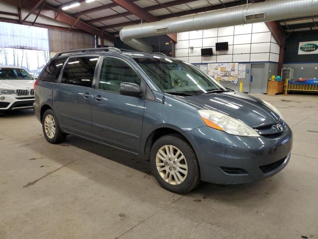 Photo 3 VIN: 5TDJK4CC3AS031091 - TOYOTA SIENNA LE 