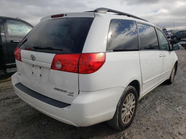 Photo 3 VIN: 5TDJK4CC4AS030919 - TOYOTA SIENNA LE 