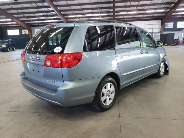 Photo 3 VIN: 5TDKK4CC0AS308302 - TOYOTA SIENNA CE 