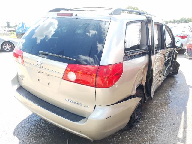 Photo 3 VIN: 5TDKK4CC3AS321559 - TOYOTA SIENNA CE 