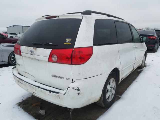 Photo 3 VIN: 5TDKK4CC4AS340153 - TOYOTA SIENNA CE 