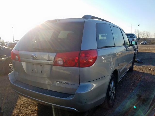 Photo 3 VIN: 5TDKK4CC5AS301006 - TOYOTA SIENNA CE 