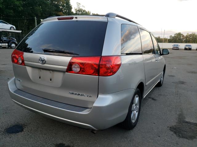 Photo 3 VIN: 5TDKK4CC5AS319795 - TOYOTA SIENNA CE 