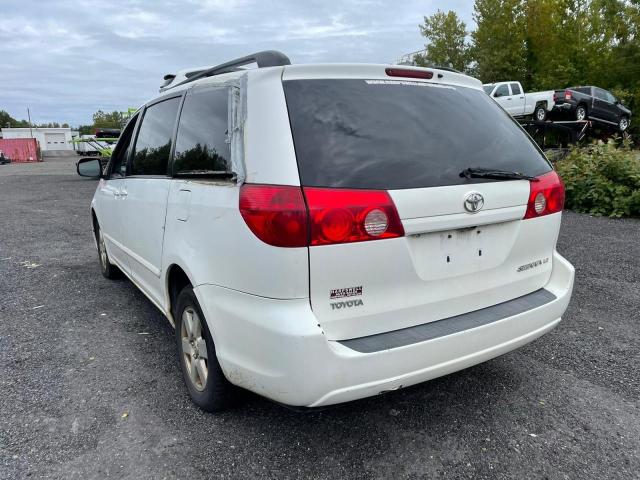 Photo 2 VIN: 5TDKK4CC7AS320303 - TOYOTA SIENNA CE 