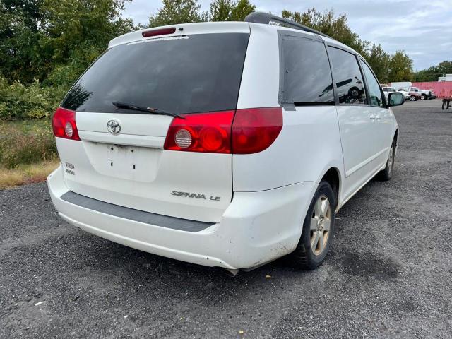 Photo 3 VIN: 5TDKK4CC7AS320303 - TOYOTA SIENNA CE 