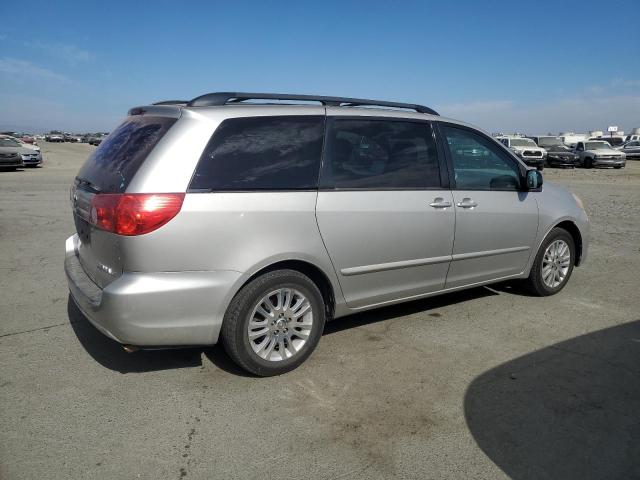 Photo 2 VIN: 5TDKK4CC8AS291247 - TOYOTA SIENNA CE 