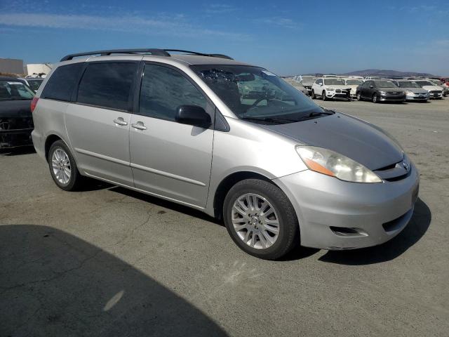 Photo 3 VIN: 5TDKK4CC8AS291247 - TOYOTA SIENNA CE 