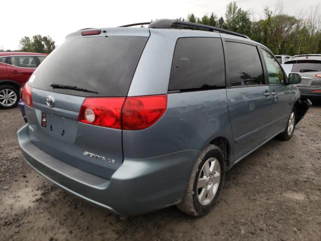 Photo 3 VIN: 5TDKK4CC8AS302876 - TOYOTA SIENNA CE 