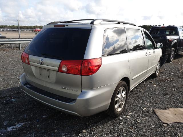 Photo 3 VIN: 5TDKK4CC9AS320299 - TOYOTA SIENNA CE 