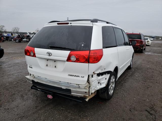 Photo 3 VIN: 5TDKK4CCXAS299060 - TOYOTA SIENNA CE 