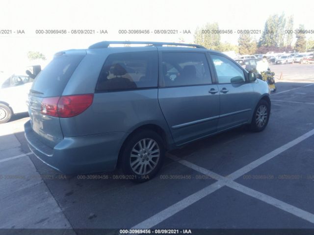 Photo 3 VIN: 5TDKK4CCXAS318772 - TOYOTA SIENNA 