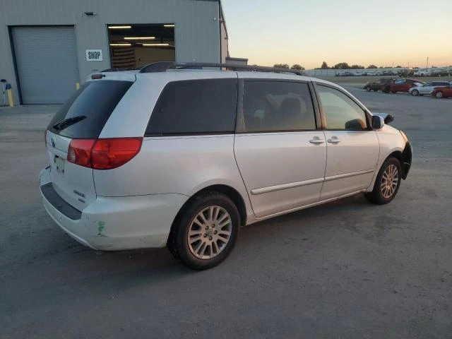 Photo 2 VIN: 5TDYK4CC7AS341355 - TOYOTA SIENNA XLE 