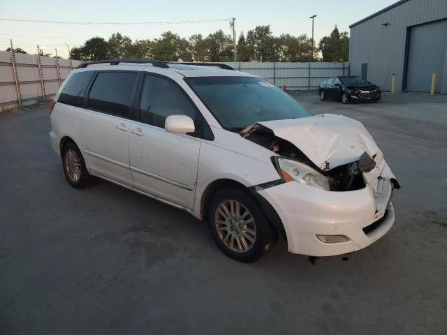 Photo 3 VIN: 5TDYK4CC7AS341355 - TOYOTA SIENNA XLE 