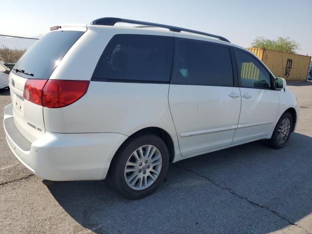 Photo 2 VIN: 5TDYK4CC8AS330669 - TOYOTA SIENNA XLE 