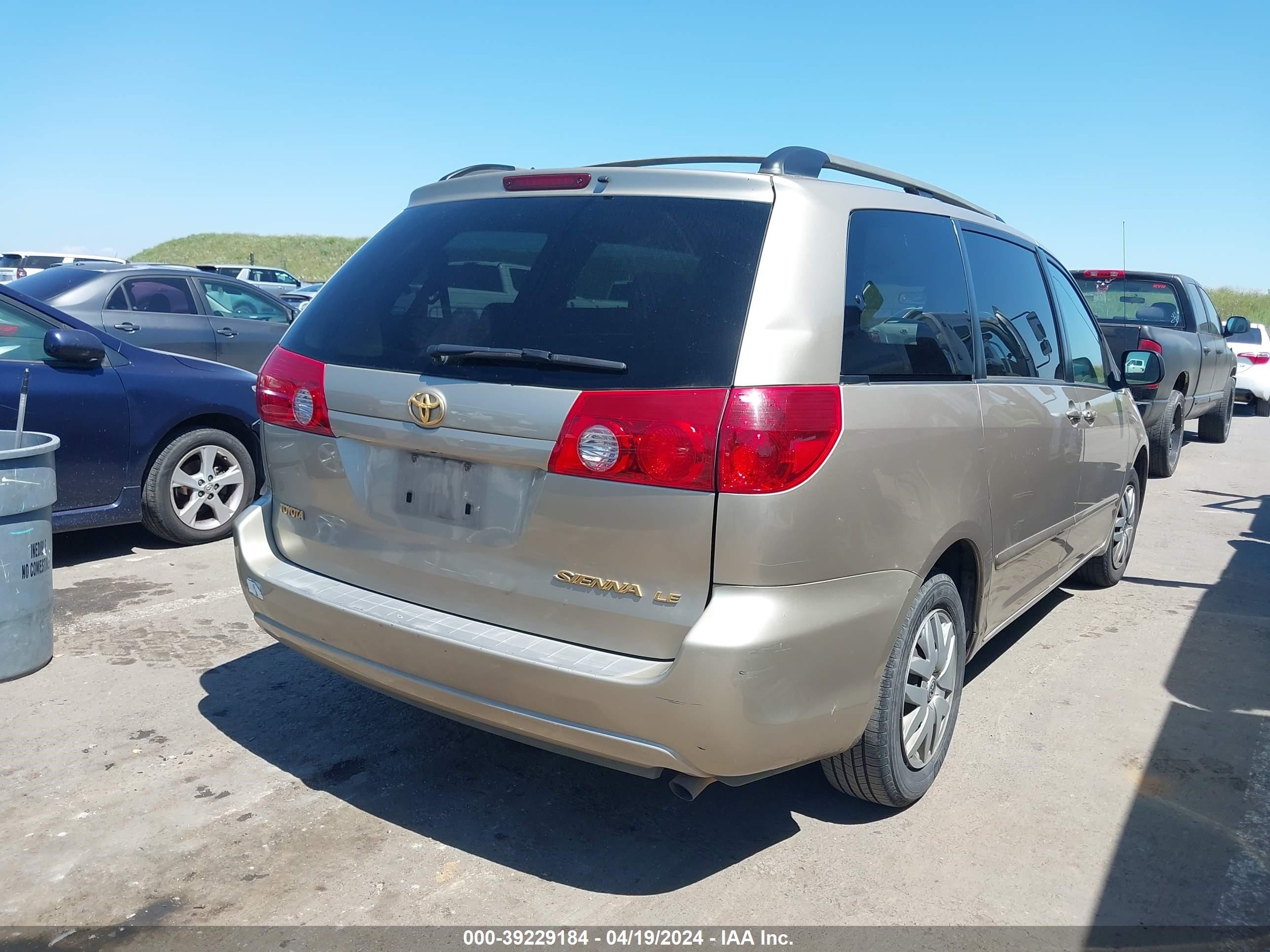 Photo 3 VIN: 5TDZA23C26S581495 - NISSAN VERSA 