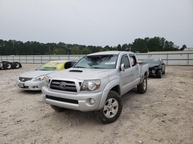 Photo 1 VIN: 5TEJU4GN8AZ685058 - TOYOTA TACOMA DOU 