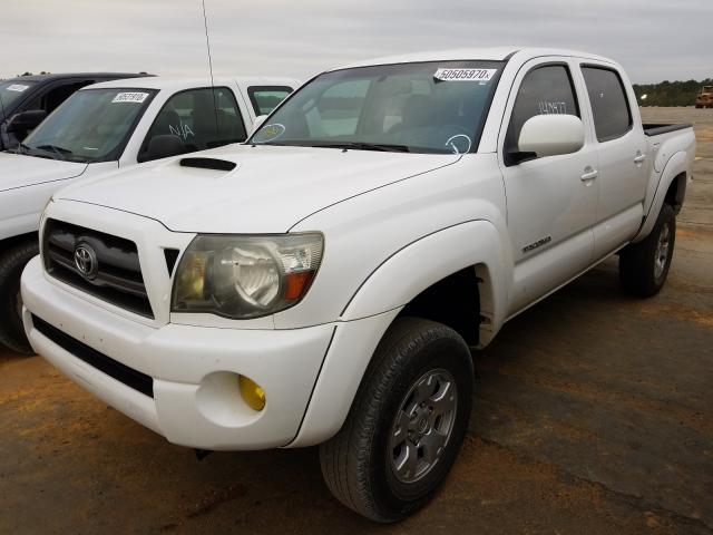 Photo 1 VIN: 5TELU4EN3AZ704174 - TOYOTA TACOMA DOU 