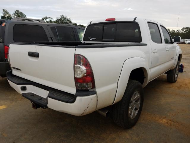 Photo 3 VIN: 5TELU4EN3AZ704174 - TOYOTA TACOMA DOU 