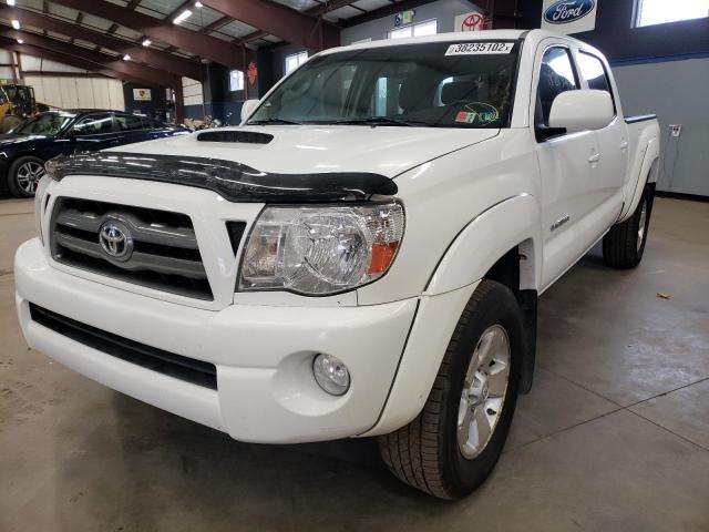 Photo 1 VIN: 5TEMU4FN5AZ711100 - TOYOTA TACOMA DOU 