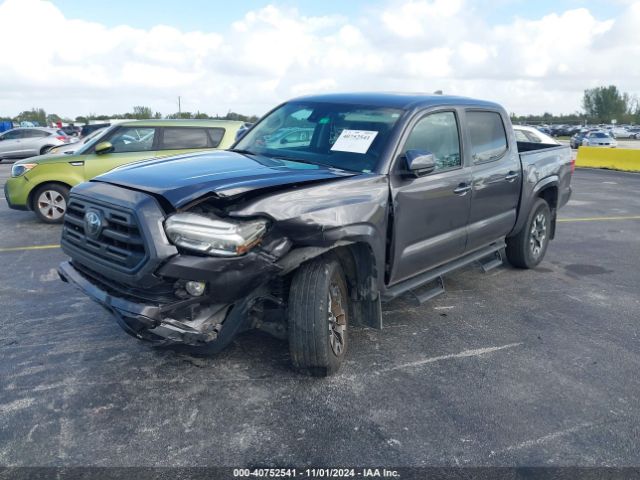 Photo 1 VIN: 5TFAX5GN0KX135990 - TOYOTA TACOMA 