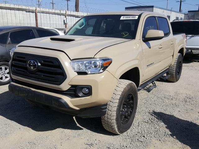 Photo 1 VIN: 5TFAX5GN1KX145024 - TOYOTA TACOMA DOU 