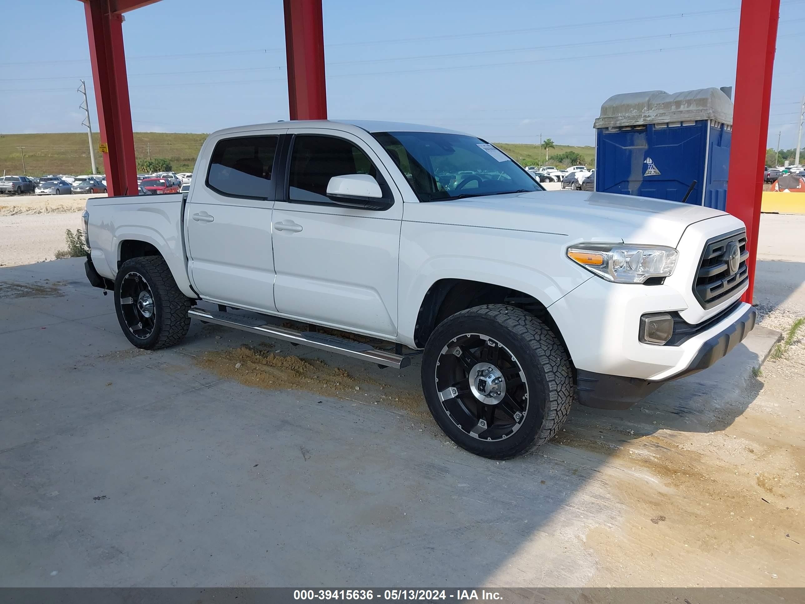 Photo 12 VIN: 5TFAX5GN4KX140836 - TOYOTA TACOMA 