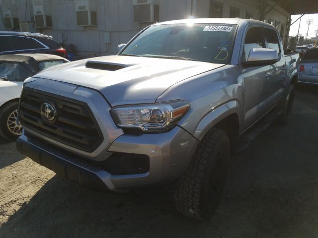 Photo 1 VIN: 5TFAX5GN5KX144118 - TOYOTA TACOMA DOU 