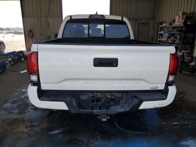 Photo 5 VIN: 5TFAX5GN6KX141874 - TOYOTA TACOMA DOU 