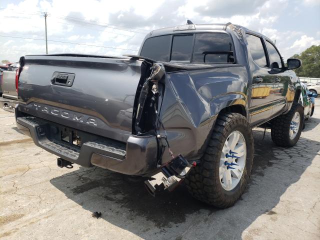 Photo 3 VIN: 5TFAX5GN6KX141924 - TOYOTA TACOMA DOU 