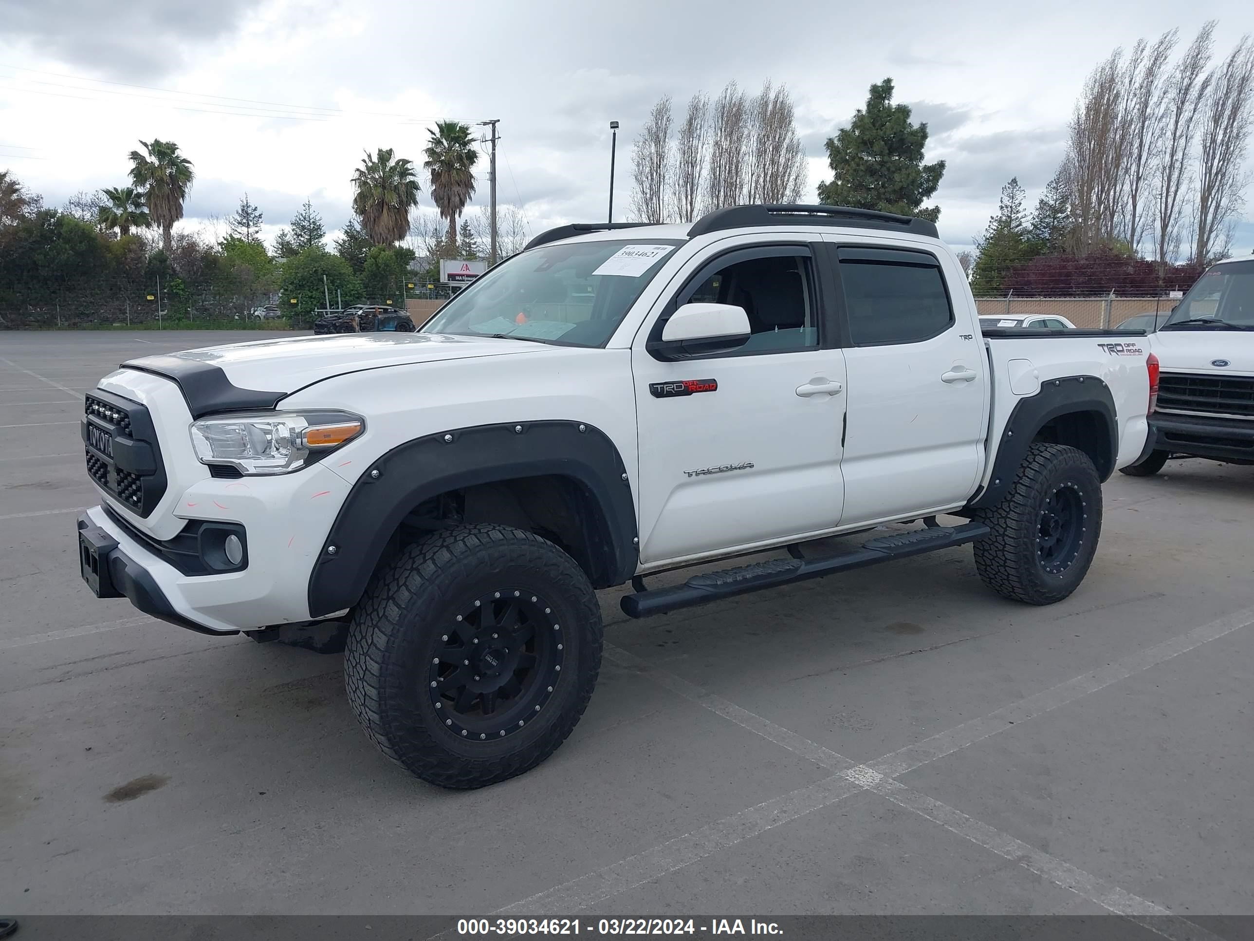 Photo 1 VIN: 5TFAX5GN7KX141592 - TOYOTA TACOMA 