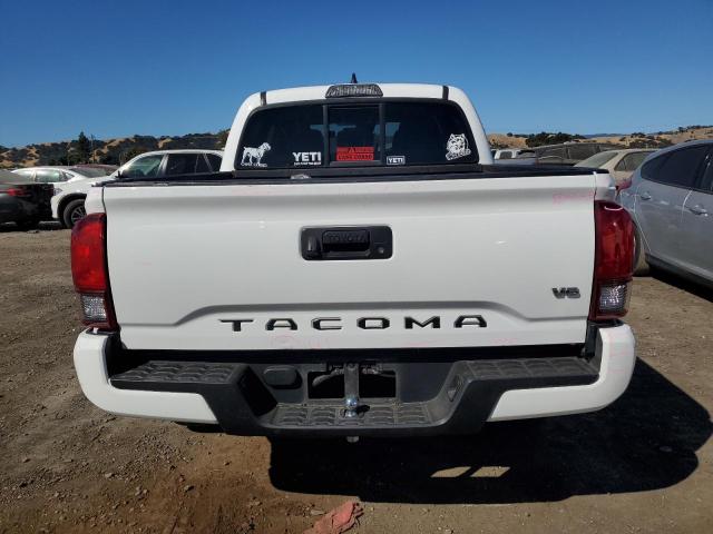 Photo 5 VIN: 5TFAX5GN8KX141715 - TOYOTA TACOMA DOU 