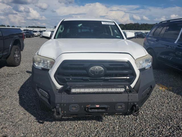 Photo 4 VIN: 5TFAX5GNXJX125899 - TOYOTA TACOMA DOU 