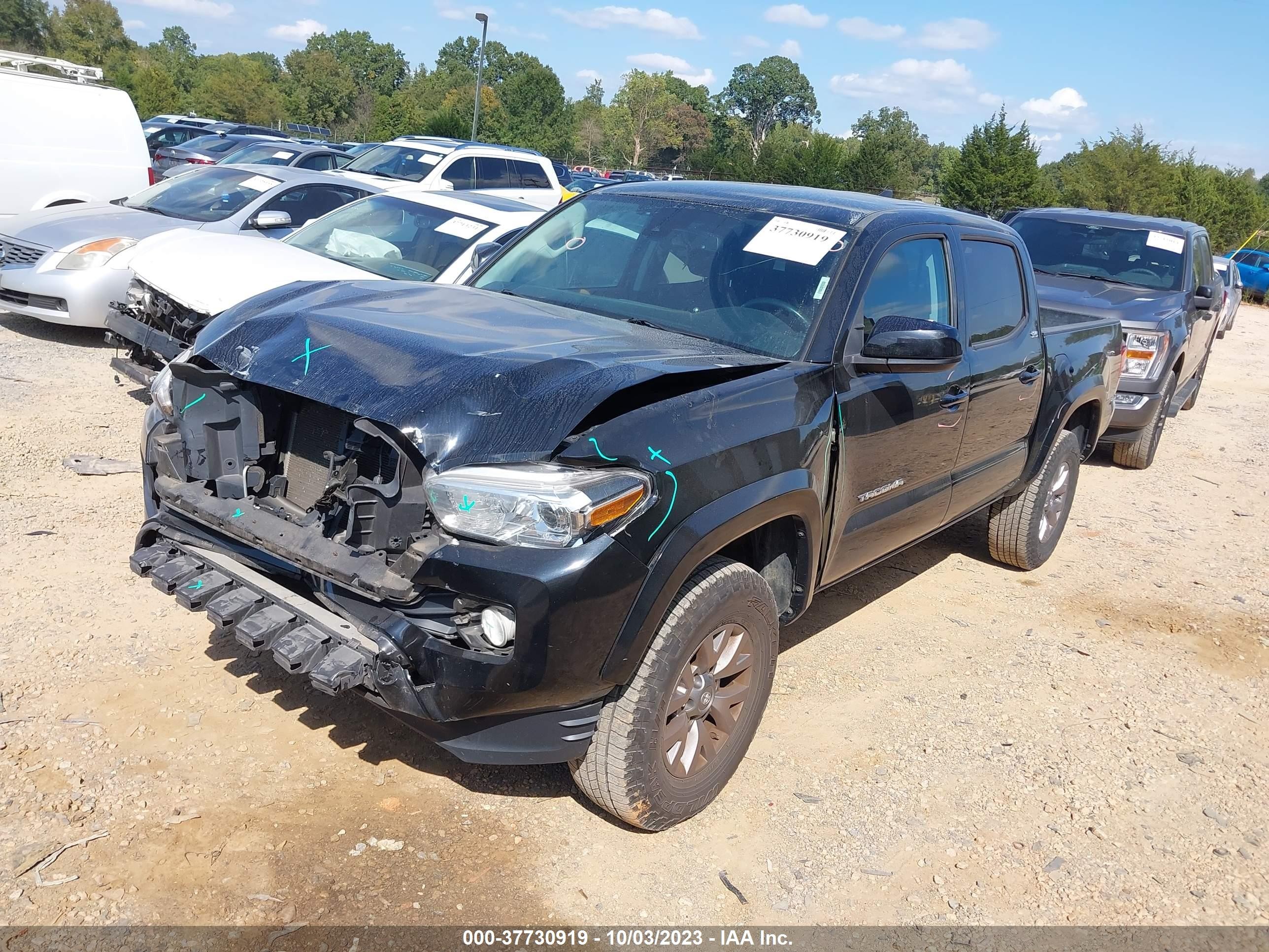 Photo 1 VIN: 5TFAZ5CN6KX076556 - TOYOTA TACOMA 