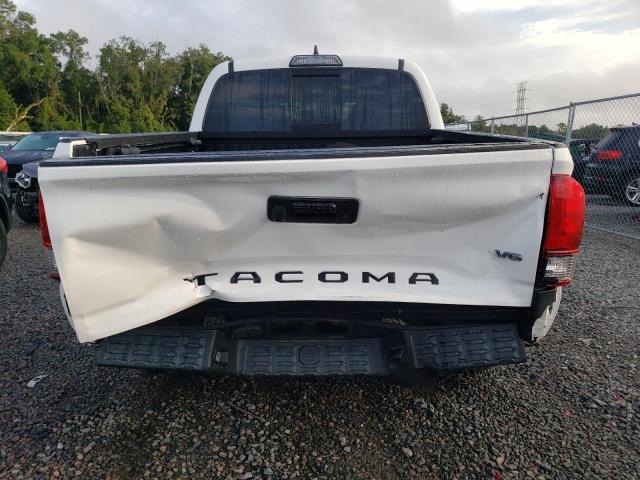 Photo 5 VIN: 5TFAZ5CN7KX075853 - TOYOTA TACOMA DOU 