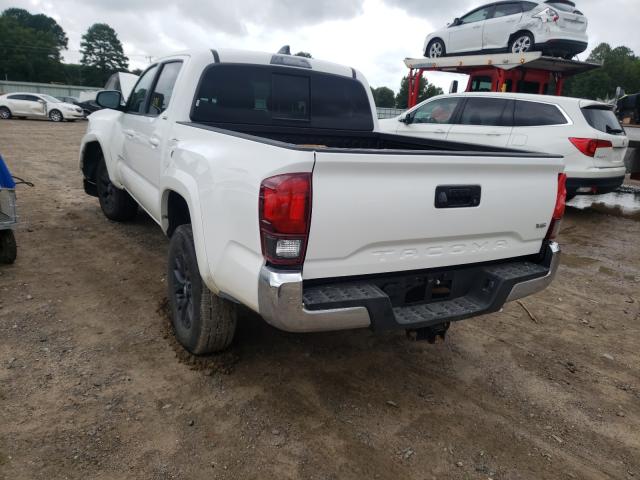 Photo 2 VIN: 5TFAZ5CN8MX106031 - TOYOTA TACOMA DOU 