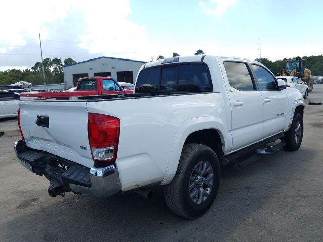 Photo 3 VIN: 5TFAZ5CN9GX007531 - TOYOTA TACOMA DOU 