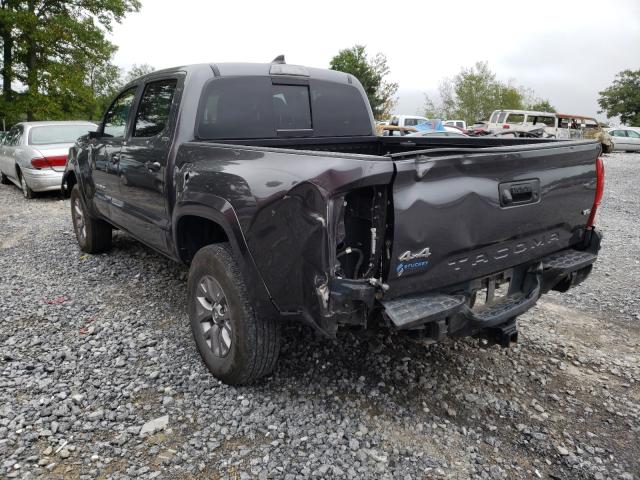 Photo 2 VIN: 5TFCZ5AN7KX177617 - TOYOTA TACOMA DOU 