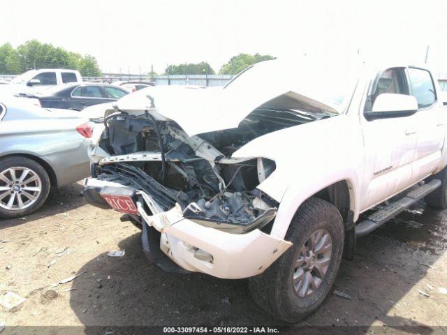 Photo 5 VIN: 5TFCZ5AN8KX202024 - TOYOTA TACOMA 4WD 