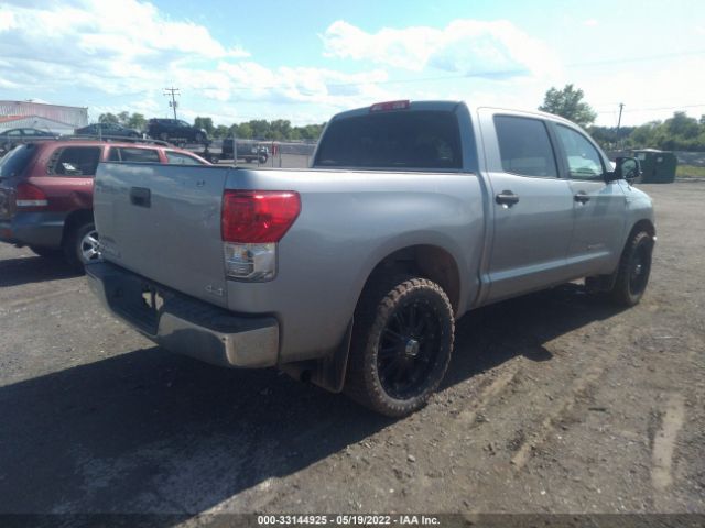 Photo 3 VIN: 5TFDM5F19AX002700 - TOYOTA TUNDRA 4WD TRUCK 