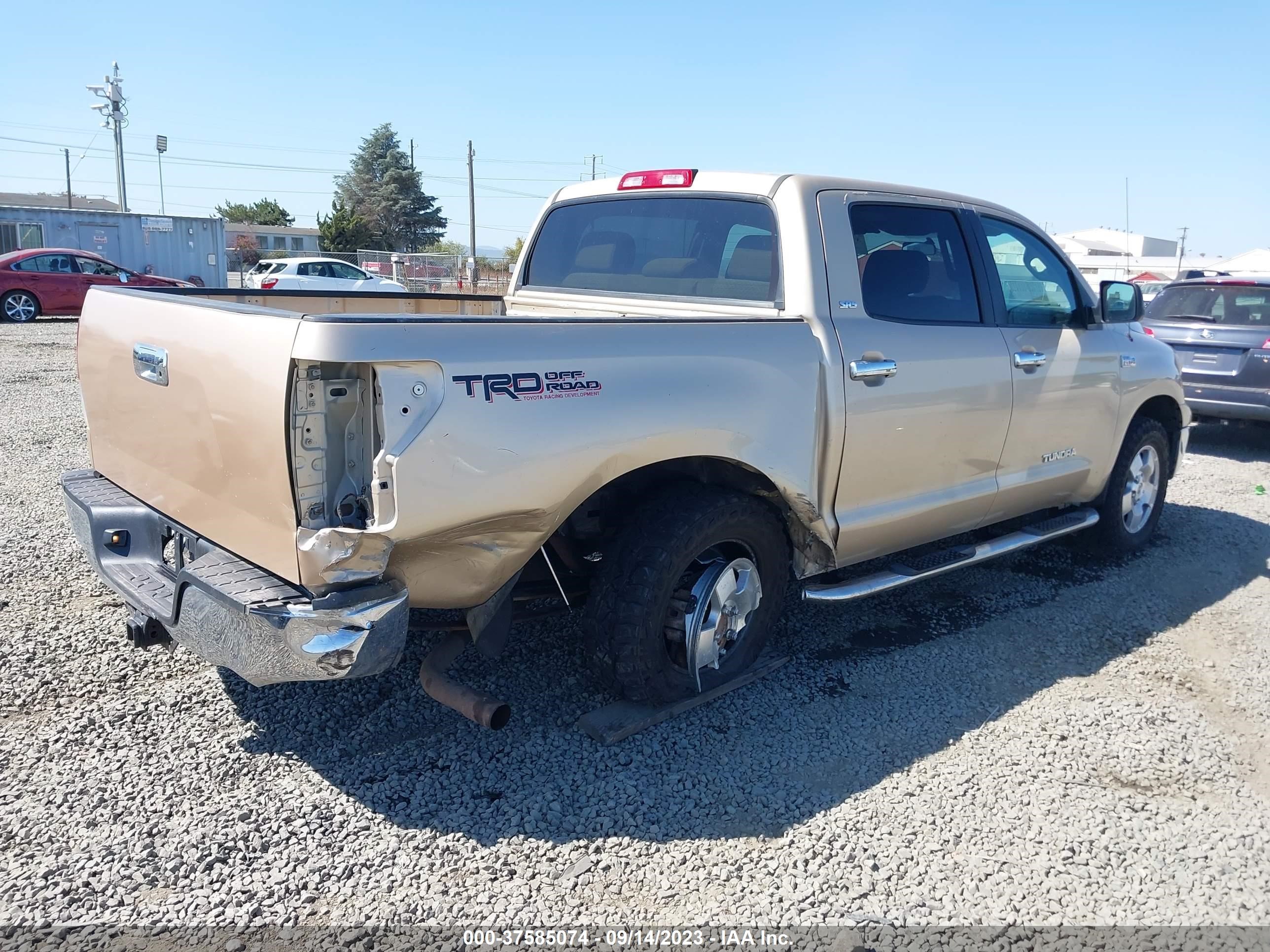 Photo 3 VIN: 5TFDY5F10AX142669 - TOYOTA TUNDRA 