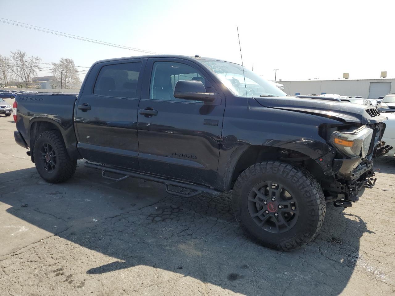 Photo 3 VIN: 5TFDY5F17KX843923 - TOYOTA TUNDRA 