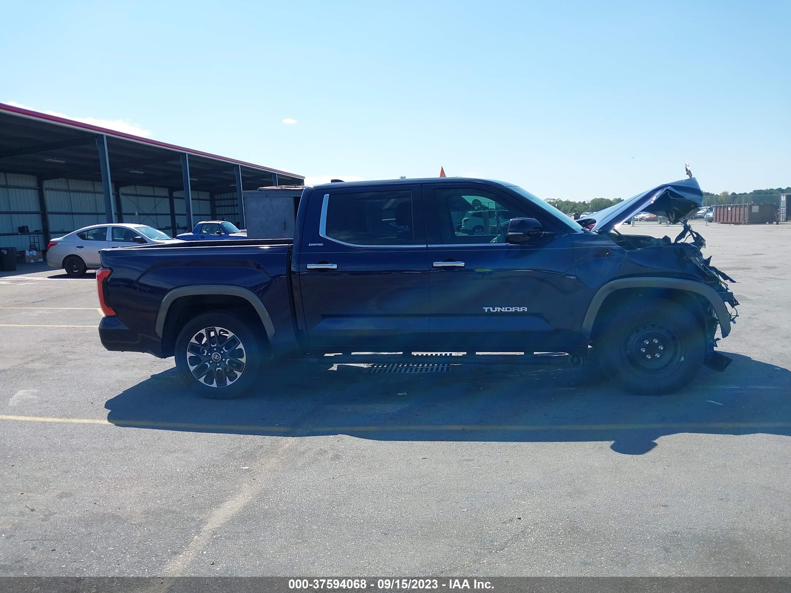 Photo 12 VIN: 5TFJA5AB8NX004892 - TOYOTA TUNDRA 